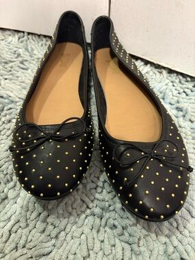 Brash black flats gold dotted and bowed